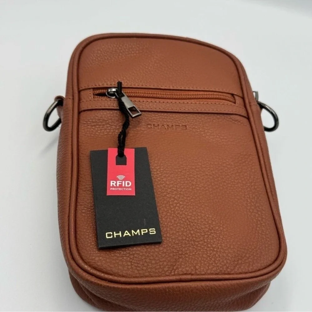 Champs NWT Onyx Brown leather sling Bag w adjustable Strap and Minimalist Design